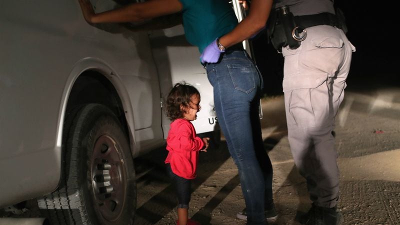 A two-year-old Honduran asylum seeker cries as her mother is searched and detained near the U.S.-Mexico border on June 12, 2018 in McAllen, Texas. The asylum seekers had rafted across the Rio Grande from Mexico and were detained by U.S. Border Patrol agents before being sent to a processing center for possible separation. Customs and Border Protection (CBP) is executing the Trump administration's 'zero tolerance' policy towards undocumented immigrants. U.S. Attorney General Jeff Sessions also said that domestic and gang violence in immigrants' country of origin would no longer qualify them for political asylum status.
