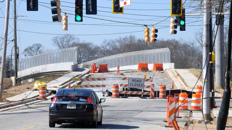 A new bridge over the Norfolk-Southern railroad is under construction on McDonough Boulevard in Fulton County. Federal money from a bipartisan infrastructure law could help expedite construction of structurally deficient bridges. (Daniel Varnado/For The Atlanta Journal-Constitution)