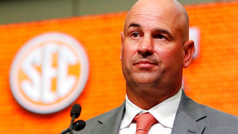FILE - Then-Tennessee NCAA college football head coach Jeremy Pruitt speaks during Southeastern Conference Media Days in Atlanta, July 18, 2018. The NCAA on Friday, July 22, 2022, charged Tennessee with 18 recruiting violations involving allegations of illegal cash, gifts and benefits given under fired football coach Jeremy Pruitt.(AP Photo/John Bazemore, File)