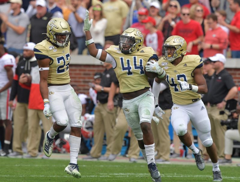 Georgia Tech linebacker Quez Jackson (44) celebrates with teammates after he recovered a fumble by Georgia running back D'Andre Swift (7) during the first half of an NCAA college football game at Bobby Dodd Stadium on Saturday, November 30, 2019. Georgia won 52-7 over the Georgia Tech. (Hyosub Shin / Hyosub.Shin@ajc.com)