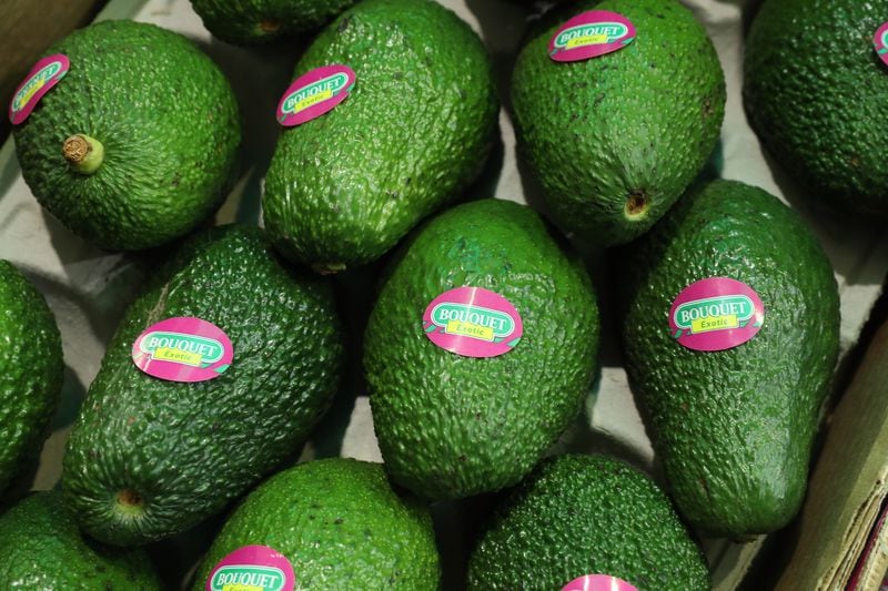 Avocados lie on display at a Spanish producer's stand at the Fruit Logistica agricultural trade fair in Berlin, Germany.
