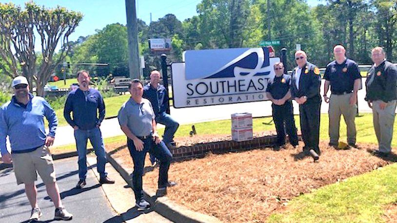 Ben Looper, Wes McCall and his team at Southeast Restoration donate 7,400 medical gloves to Fire Chief Tim Prather, Battalion Chief of Support Services Marc Liscio, and Sgt. Bryan Thomas and Jason Cooper of Cherokee County Fire & Emergency Services. CHEROKEE COUNTY FIRE