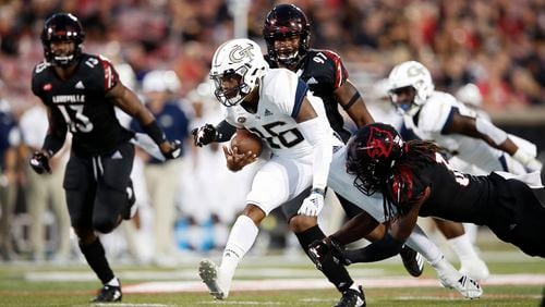 LOUISVILLE, KY - OCTOBER 05: TaQuon Marshall #16 of the Georgia Tech Yellow Jackets runs the ball in the first half of the game against the Louisville Cardinals at Cardinal Stadium on October 05, 2018 in Louisville, Kentucky. (Photo by Joe Robbins/Getty Images)