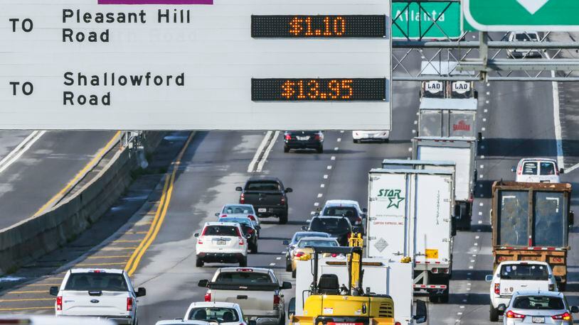 LEDE PHOTO - August 22, 2016 Gwinnett County: The cost to drive the 16-mile stretch of "HOT" express lanes on I-85 southbound in Gwinnett and DeKalb counties increased to a record $13.95 Monday, Aug. 22, 2016 according to the State Road and Tollway Authority. That is the maximum amount allowed by law. The previous record, set in November 2015, was $12. The State Road and Tollway Authority announced earlier this month that toll rates for several parts of I-85's HOT lanes would increase starting Monday. The change is aimed at reducing HOT lane congestion and providing "a more reliable and predictable commute for Peach Pass Customers," The Atlanta Journal-Constitution previously reported. The increase will remain in effect from 7 to 9 a.m. and 4 to 6 p.m. each day. JOHN SPINK /JSPINK@AJC.COM