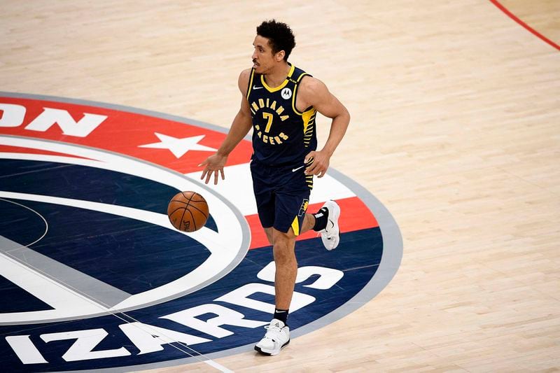 Indiana Pacers guard Malcolm Brogdon (7) dribbles the ball during the second half against the Washington Wizards, Thursday, May 20, 2021, in Washington. (Nick Wass/AP)