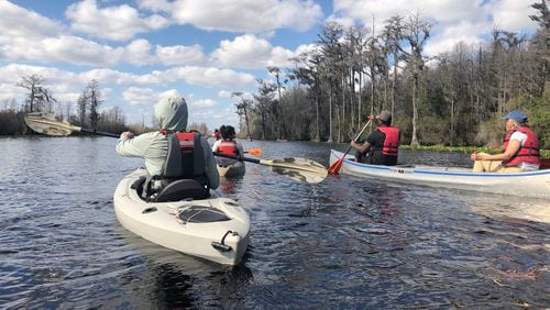 A group from The New School in Atlanta paddles the Okefenokee Swamp during a field trip earlier this year. (Susan Heisey, US Fish and Wildlife Service/Courtesy of The New School)