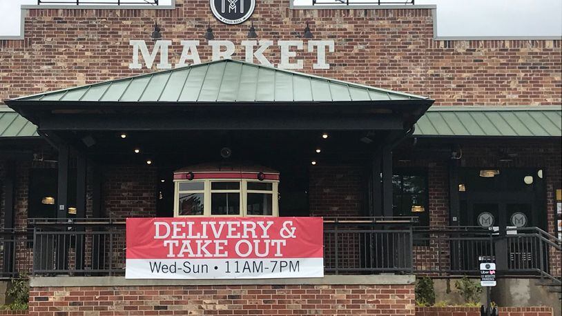 Five vendors currently are operating for takeout and delivery at Marietta Square Market. Ten additional food vendors are expected to reopen in May. LIGAYA FIGUERAS / LIGAYA.FIGUERAS@AJC.COM