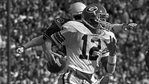 Georgia quarterback John Lastinger runs the ball against Texas in the 1984 Cotton Bowl. (AJC file photo)