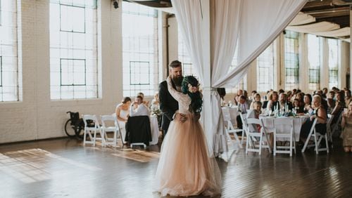 Jaquie Goncher, 25, walked at her wedding in Atlanta in May 2016 after being told by doctors she would never walk again after a pool accident. (Photo via Love Stories by Halie + Alec)