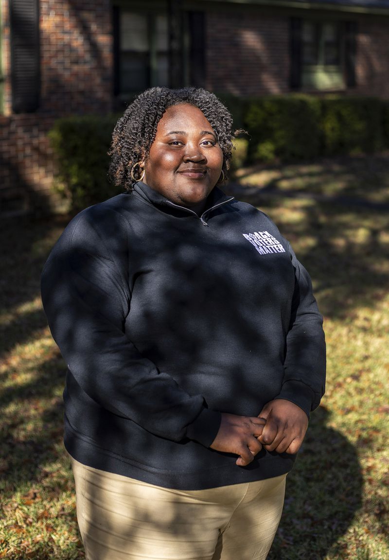 Kiana Jackson, 23, is a graduate student at Johns Hopkins University and the Georgia regional organizer for the Black Voters Matter Fund. Her family was concerned when she got involved in politics, but she eventually won them over. In 2018, she registered her 50-year-old father to vote. (Alyssa Pointer / Alyssa.Pointer@ajc.com)