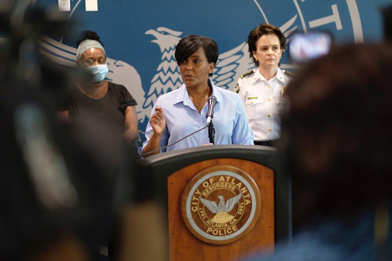 Atlanta Mayor Keisha Lance Bottoms announced a 9 p.m. curfew Sunday, March 31, 2020, as protests continued. At the press conference with Police Chief Erika Shields (right), Bottoms apologized for what she said was clearly excessive force used by Atlanta police officers in the arrest of two young African Americans on Saturday night. (Photo: Ben Gray for  The Atlanta Journal-Constitution)