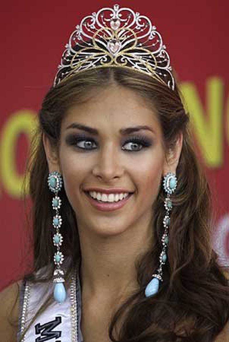 Dayana Mendoza, Miss Venezuela, reacts during a press conference after winning the Miss Universe 2008 beauty pageant.