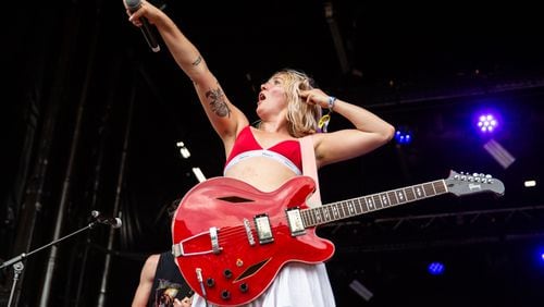 Nashville's Winona Fighter, with frontwoman Coco leading the charge, was the second act to take the Ponce de Leon stage at Shaky Knees on Friday, May 3, 2024. (RYAN FLEISHER FOR THE ATLANTA JOURNAL-CONSTITUTION)
