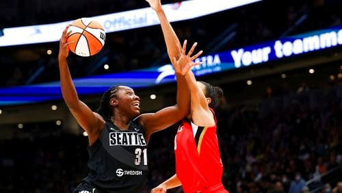 Seattle Storm center Tina Charles (31) goes up to the basket against Las Vegas Aces center Kiah Stokes (41) during the first half of Game 4 of a WNBA basketball playoff semifinal Tuesday, Sept. 6, 2022, in Seattle. (AP Photo/Lindsey Wasson)