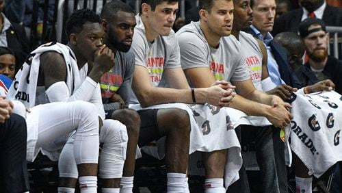 Atlanta Hawks players wait on the bench during the final moments of an NBA basketball game against the Portland Trail Blazers, Saturday, March 18, 2017, in Atlanta. Portland won 113-97. (AP Photo/John Amis)