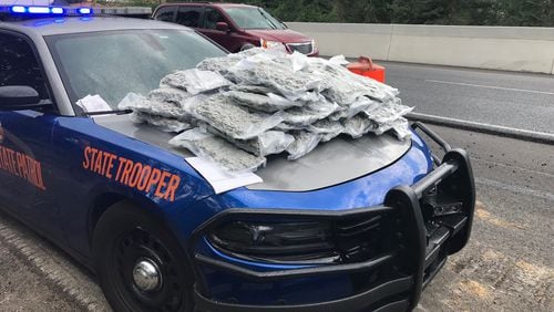 The GBI said three people were arrested after $200,000 worth of marijuana was seized during a traffic stop Tuesday.
