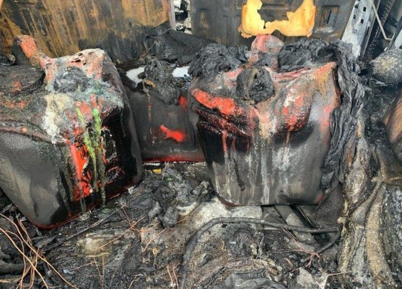 Fire crews found four 5-gallon containers filled with gasoline in the back of the Hummer, the Citrus County Chronicle reported. (Citrus County Fire Rescue)