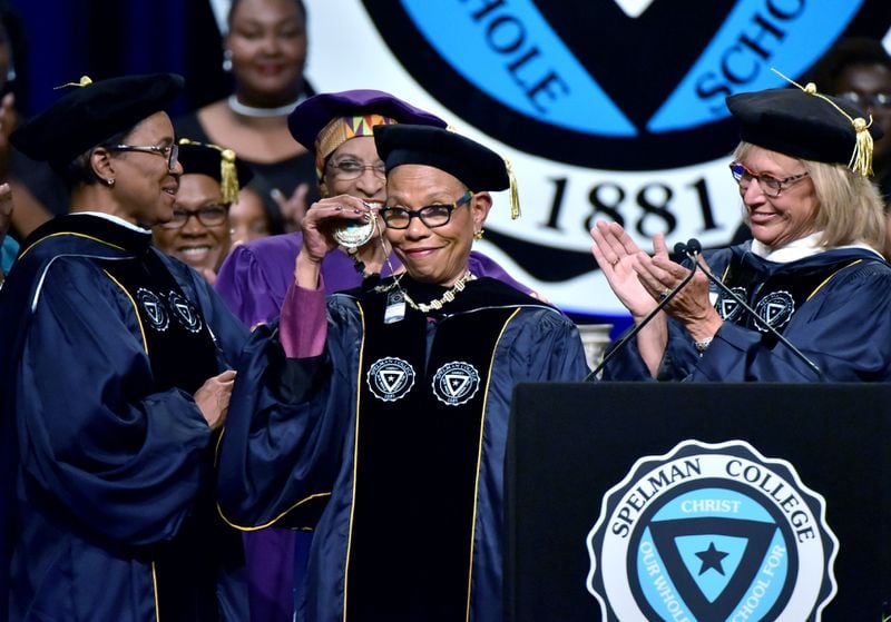 SPELMAN PRESIDENT INSTALLED--April 9, 2016 Atlanta - Dr. Mary Schmidt Campbell shows her medallion during Spelman College 2016 Investiture Ceremony at Georgia World Congress Center on Saturday, April 9, 2016. Mary Schmidt Campbell, former dean emerita of the Tisch School of the Arts at New York University, was installed as its 10th president of Spelman College on Saturday at the Georgia World Congress Center. HYOSUB SHIN / HSHIN@AJC.COM