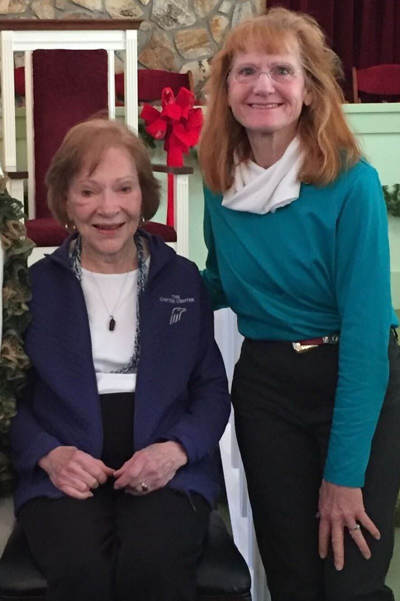 Rosalynn Carter is seen smiling with Nancy Spice at Maranatha Baptist Church in Plains, Georgia, on Christmas Day in 2019.