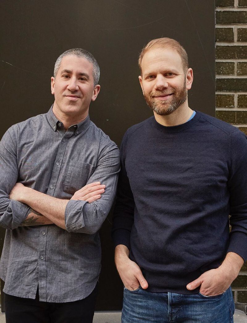 Michael Solomonov (left) and Steven Cook are the authors of the newly published cookbook “Israeli Soul.” CONTRIBUTED BY MICHAEL PERSICO