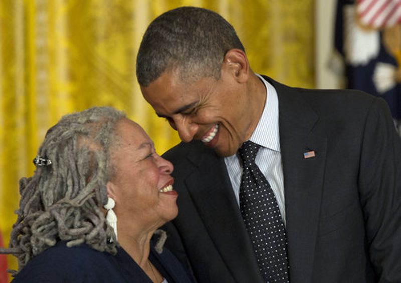 President Barack Obama looks to author Toni Morrison before awarding her the Presidential Medal of Freedom on May 29, 2012, in the East Room of the White House in Washington. (AP Photo/Carolyn Kaster)