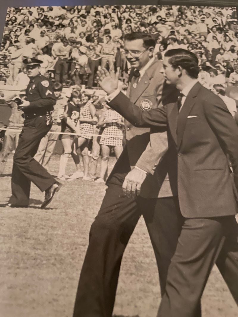 Prince Charles walking with University of Georgia President Fred Davison during a Georgia Bulldogs game in October 1977 (Photo by Judy Bynum / Contributed)