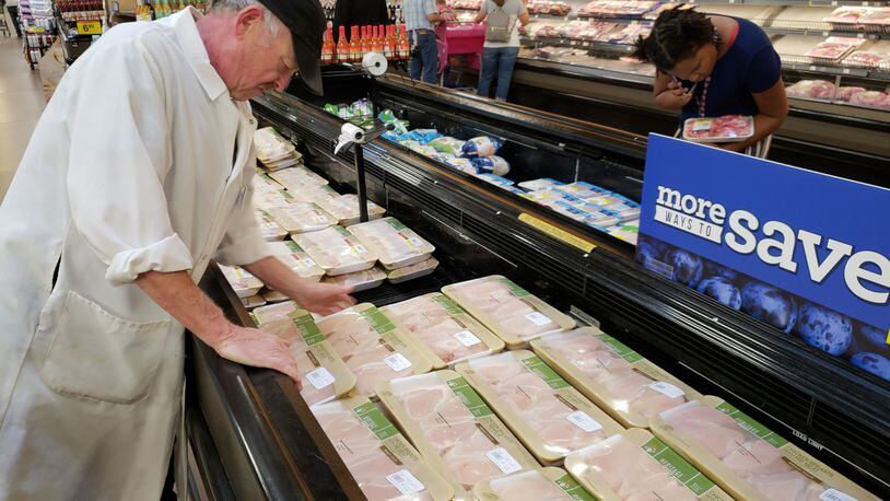 At a grocery in Gainesville, a city that dubs itself the Poultry Capital of the World, a butcher stocks cases with plenty of chicken. But increasingly businesses are offering consumers plant-based substitutes. Tyson Foods, one of the nation’s largest meat producers, said it will launch a plant-based nugget product this summer. MATT KEMPNER / AJC
