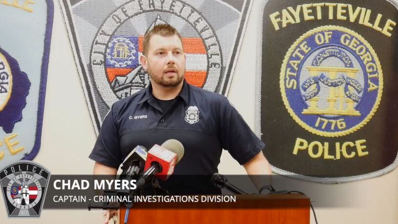 Capt. Chad Myers of the Fayetteville Police Department addresses the media to announce a human trafficking sting operation that led to 21 arrests at two hotels in Fayette County.