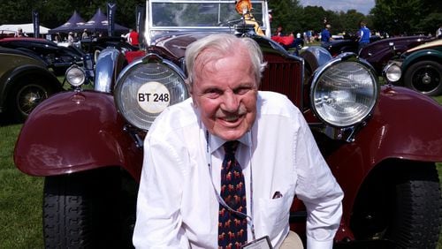 Don Peterson was editor and owner of Car Collector magazine, an expert appraiser of classic cars, and a board member of the Classic Car Club of America in front of his  burgundy 1930 Packard 734 Speedster, only six of which still exist.