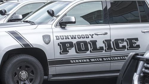 6/10/2019 — Atlanta, Georgia — Dunwoody police cars are parked outside of the City of Dunwoody municipal building, Monday, June, 10, 2019. (Alyssa Pointer/alyssa.pointer@ajc.com)