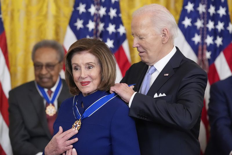 President Joe Biden awards the nation's highest civilian honor, the Presidential Medal of Freedom, to Rep. Nancy Pelosi, D-Calif., during a ceremony in the East Room of the White House, Friday, May 3, 2024, in Washington. (AP Photo/Alex Brandon)