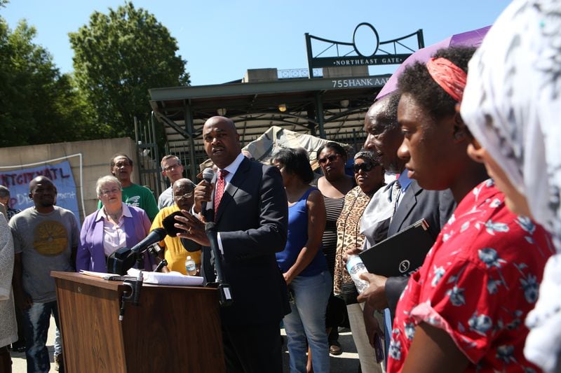 Atlanta City Councilmember Kwanza Hall speaks at a press conference held by neighborhood residents at Tent City in Atlanta, Georgia, on April 26, 2017. (HENRY TAYLOR / HENRY.TAYLOR@AJC.COM)