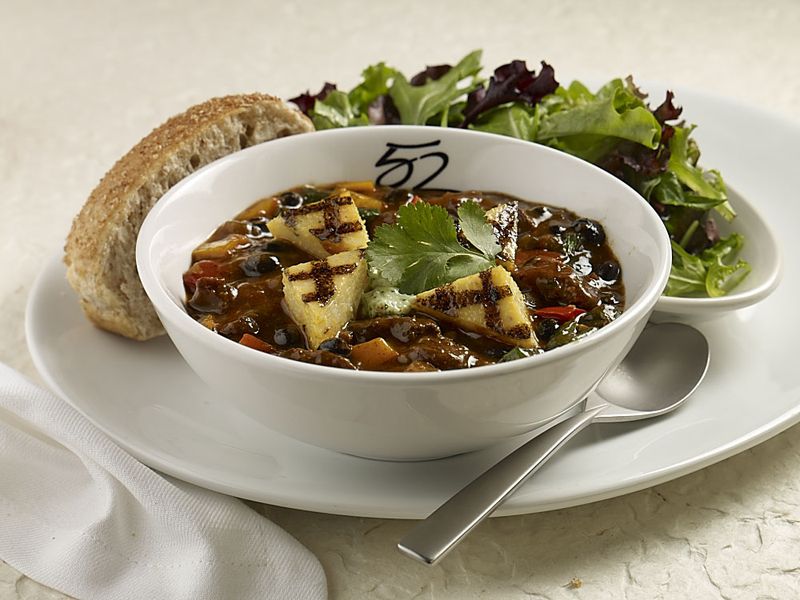 Atlanta restaurant Seasons 52 offers a dish of beef and black bean chili. Beef can be substituted with deer meat to make venison chili.