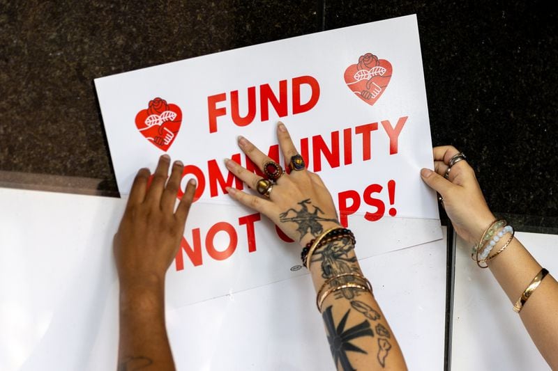 Protesters gather outside Atlanta City Hall ahead of the final vote to approve legislation to fund the public safety training center on Monday, June 5, 2023. (Arvin Temkar / arvin.temkar@ajc.com)