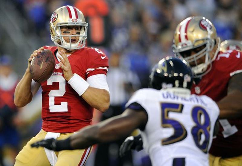 San Francisco 49ers quarterback Blaine Gabbert (2) looks for a receiver as he is pressured by Baltimore Ravens outside linebacker Elvis Dumervil (58) in the first half of an NFL preseason football game in Baltimore. A person with knowledge of the decision says quarterback Colin Kaepernick has been told he won’t start Sunday, Nov. 8, 2015, for the San Francisco 49ers, replaced by backup Gabbert. The person spoke on condition of anonymity Monday, Nov. 2, 2015, because the decision wasn’t to be discussed publicly. (AP Photo/Nick Wass, File)
