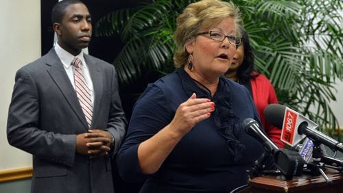 From 2013: Commissioner Elaine Boyer speaks during a press conference held by Interim DeKalb CEO Lee May (left) and DeKalb commissioners and how they plan to respond to the Grand Jury report. The findings of a year-long investigation into allegations of bid rigging and kickbacks in DeKalb County contracts, made public for the first time late Wednesday, allege a culture of corruption that spans two administrations and runs from the top job in Georgia’s third-largest county down to workers and contractors in the watershed department.