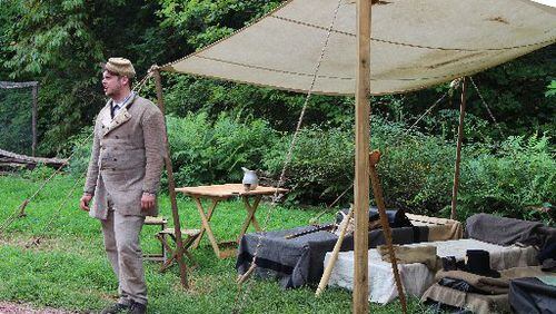A solider encampment (featuring actor Kevin Edmiston) is re-created at Smith Family Farm during Citizens and Soldiers, an annual Atlanta History Center program teaching about the Civil War. The family program will be held March 14. CONTRIBUTED BY ATLANTA HISTORY CENTER