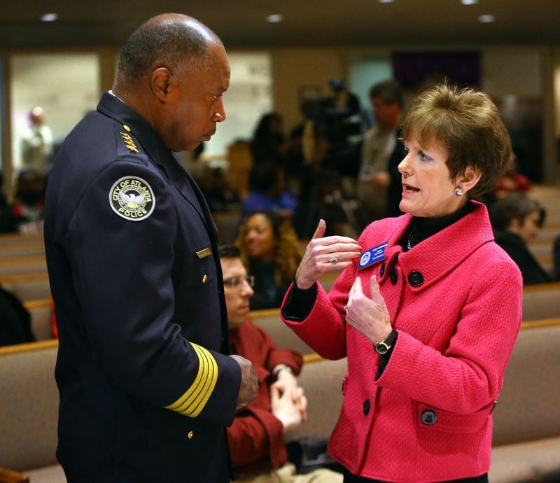 George Turner, then-Atlanta police chief, confers with Mary Norwood, who is making her second run for mayor and is third in total fundraising. CURTIS COMPTON / CCOMPTON@AJC.COM