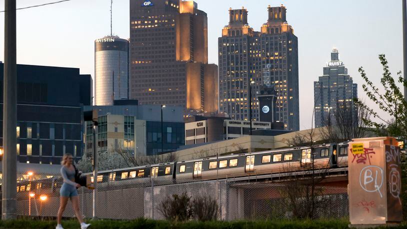 The Atlanta skyline is shown as a MARTA train leaves the Georgia State MARTA Station off of Piedmont Avenue on Monday, March 6, 2023, in Atlanta. Jason Getz / Jason.Getz@ajc.com)