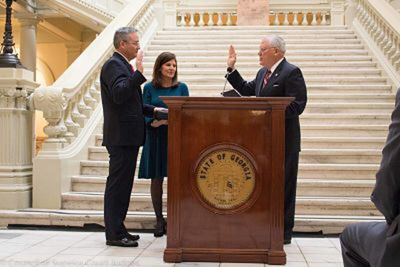 Craig Earnest (left), chief judge of the Pataula Judicial Circuit, when he was sworn in as a Superior Court judge by then-Gov. Nathan Deal (right) on Jan. 9, 2018. (Photo: Georgia Superior Courts)