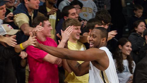 Ga. Tech forward Charles Mitchell celebrates with the crowd after Tech's 68-64 win against Virginia at McCamish Pavilion in Atlanta, Ga., Saturday, Jan. 9, 2016. (Special to the AJC/Mikki K. Harris)