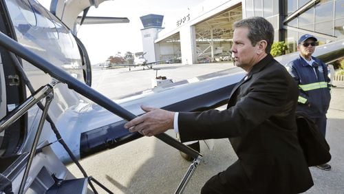 November 7, 2016 - Chamblee - Georgia Secretary of State Brian Kemp boards a plane Monday morning at Peachtree-DeKalb Airport, kicking off a statewide tour ahead Tuesday’s Election Day. BOB ANDRES /BANDRES@AJC.COM