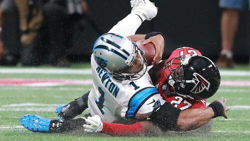 Falcons safety Damontae Kazee levels Panthers quarterback Cam Newton and is ejected from the game during the second quarter in a NFL football game on Sunday, Sept 16, 2018, in Atlanta.  Curtis Compton/ccompton@ajc.com
