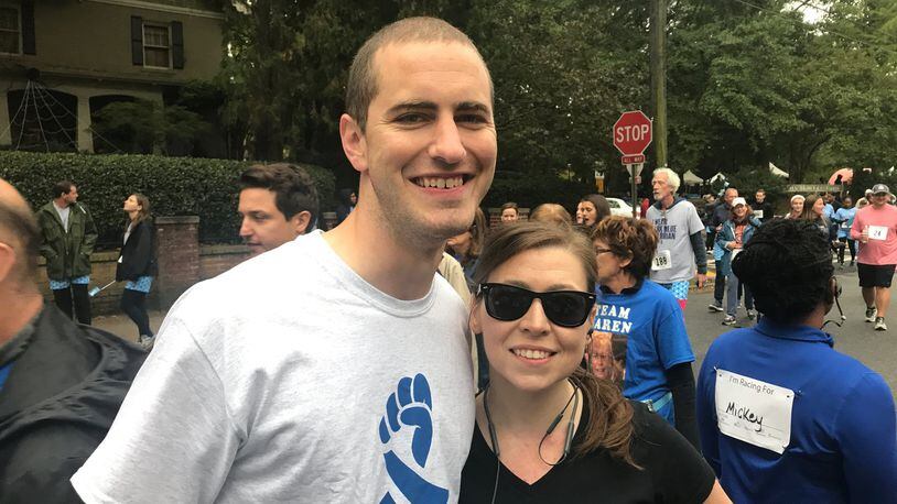 Tawny Mack with her husband, Zack Howard, before the start of Saturday’s Undy Run held annually to raise awareness about colorectal cancer. CONTRIBUTED