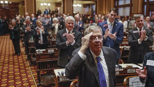 Former U.S. Sen. Johnny Isakson acknowledges applause as he is honored during a joint session of the Georgia Legislature on Jan. 16, 2020. Bob Andres / bandres@ajc.com