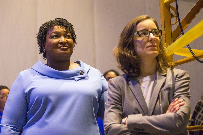 Democrat Stacey Abrams (left) and her campaign manager, Lauren Groh-Wargo, on election night. ALYSSA POINTER/ALYSSA.POINTER@AJC.COM