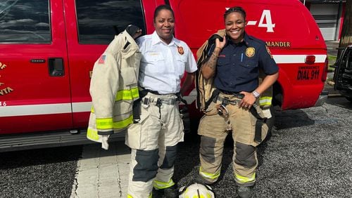 Terese Cummings (left) and Te'Quila Martin are the only female firefighting duo in the Atlanta Fire Rescue Department.