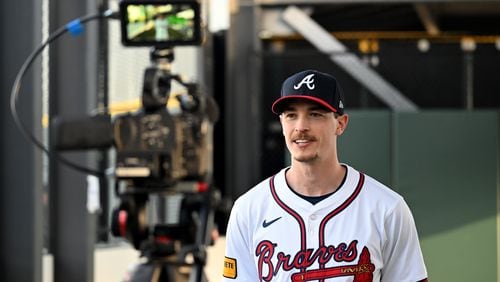 Braves starter Max Fried is interviewed in front of video camera during the team's photo day Feb. 23 in North Port, Florida. (Hyosub Shin / Hyosub.Shin@ajc.com)
