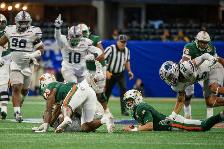 Howarddefensive back Carson Hinton recovers a fumble by Florida A&M quarterback Jeremy Moussa in the Celebration Bowl at Mercedes Benz Stadium in Atlanta, Georgia on Dec. 16, 2023. (Jamie Spaar for the Atlanta Journal Constitution)