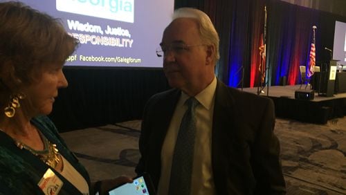 Tom Price, a former congressman and U.S. secretary of health and human services, speaks to audience members after a panel discussion on Medicaid that the Georgia Public Policy Foundation hosted Friday.